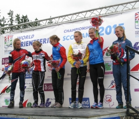 Great Britain's Cat Taylor on the podium after taking sixth place in the Women's Long race WOC2015, Grahame Nicoll