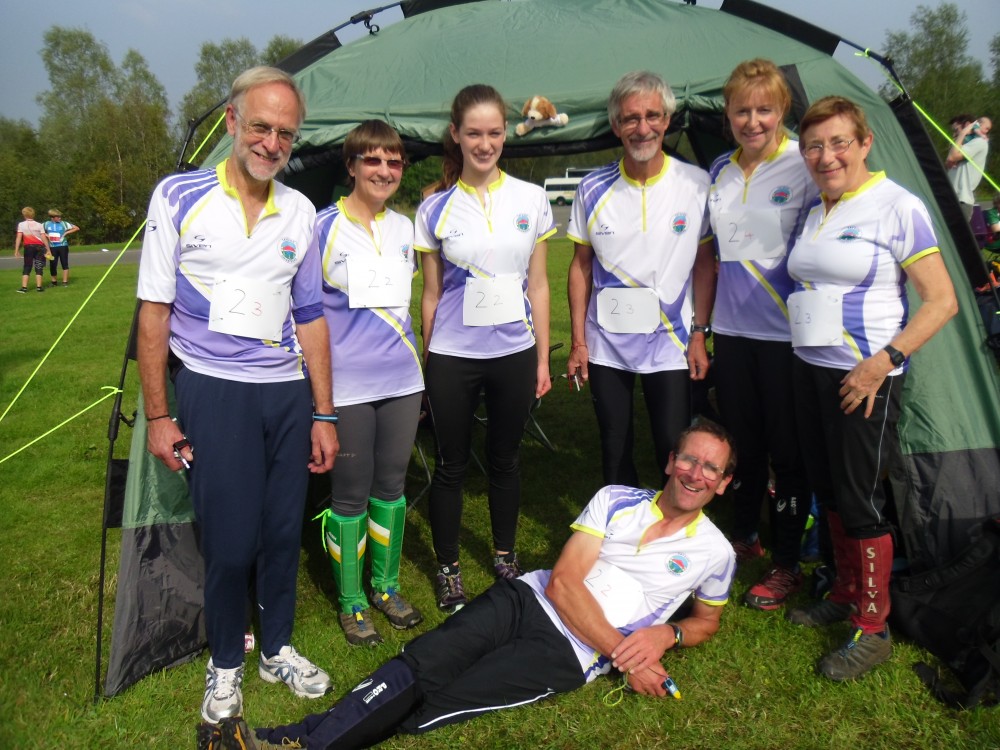 The team consider whether to carry Davie round his leg of the 8-person relay